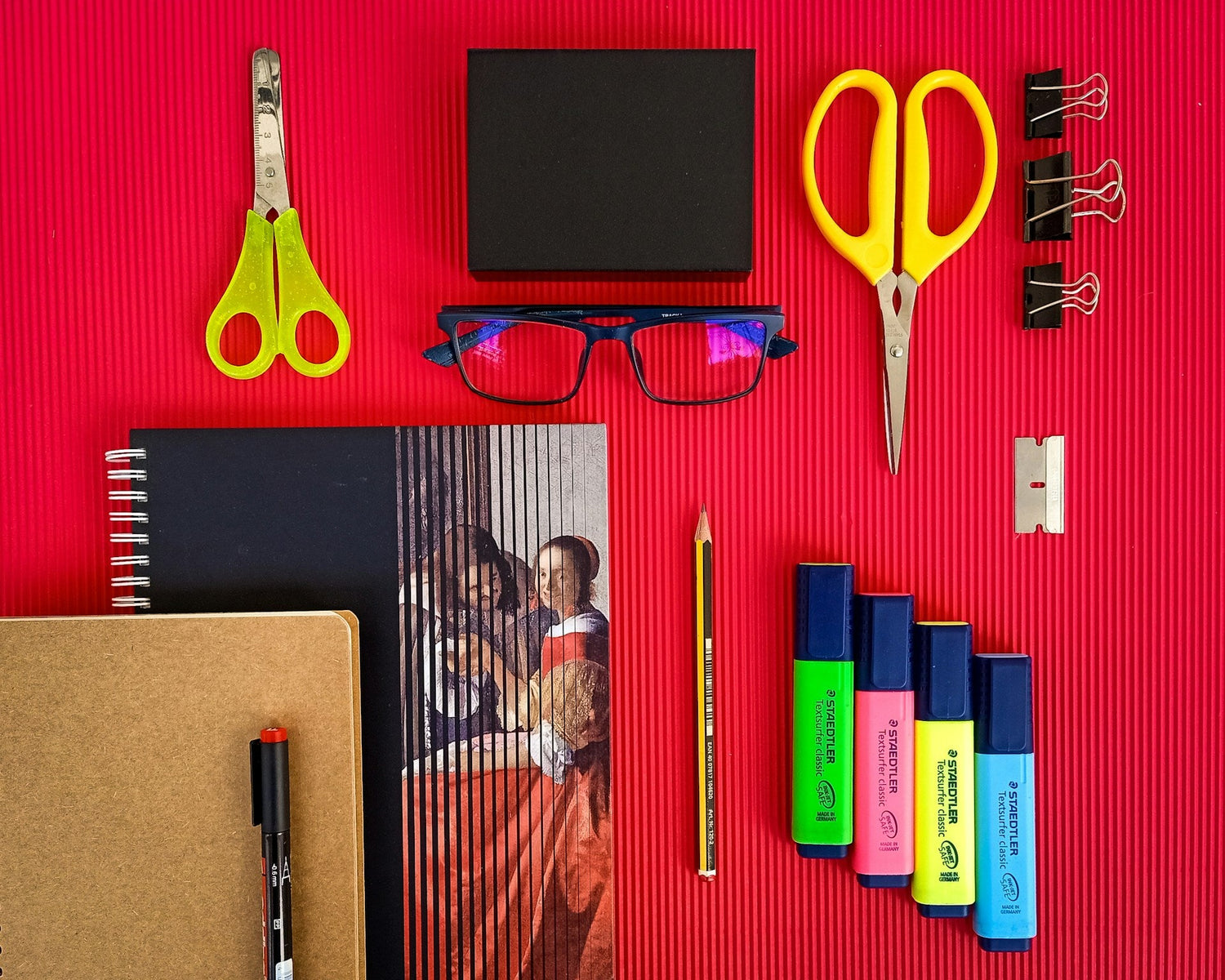 Top-rated-office-supplies-set-including-pens-notebooks-and-stapler