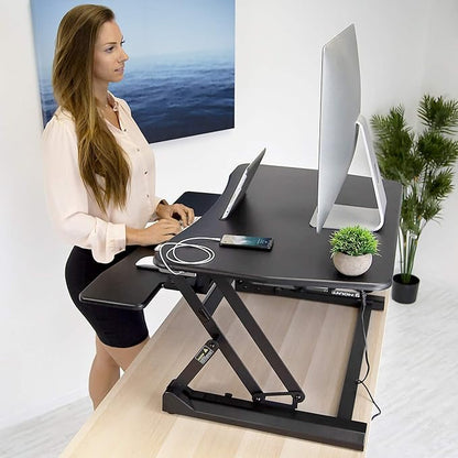 Mount-It! Electric Standing Desk Converter 35.4" x 23" Stand Up Desk Riser, Computer Workstations Motorized Desk Convertor, Sit to Stand with Built-in USB Port, Ergonomic Height Adjustable in Black